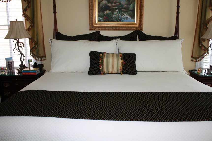 Lumbar pillow with gathered inset and trim. Flanged Euroshams in back, bedscarf in foreground